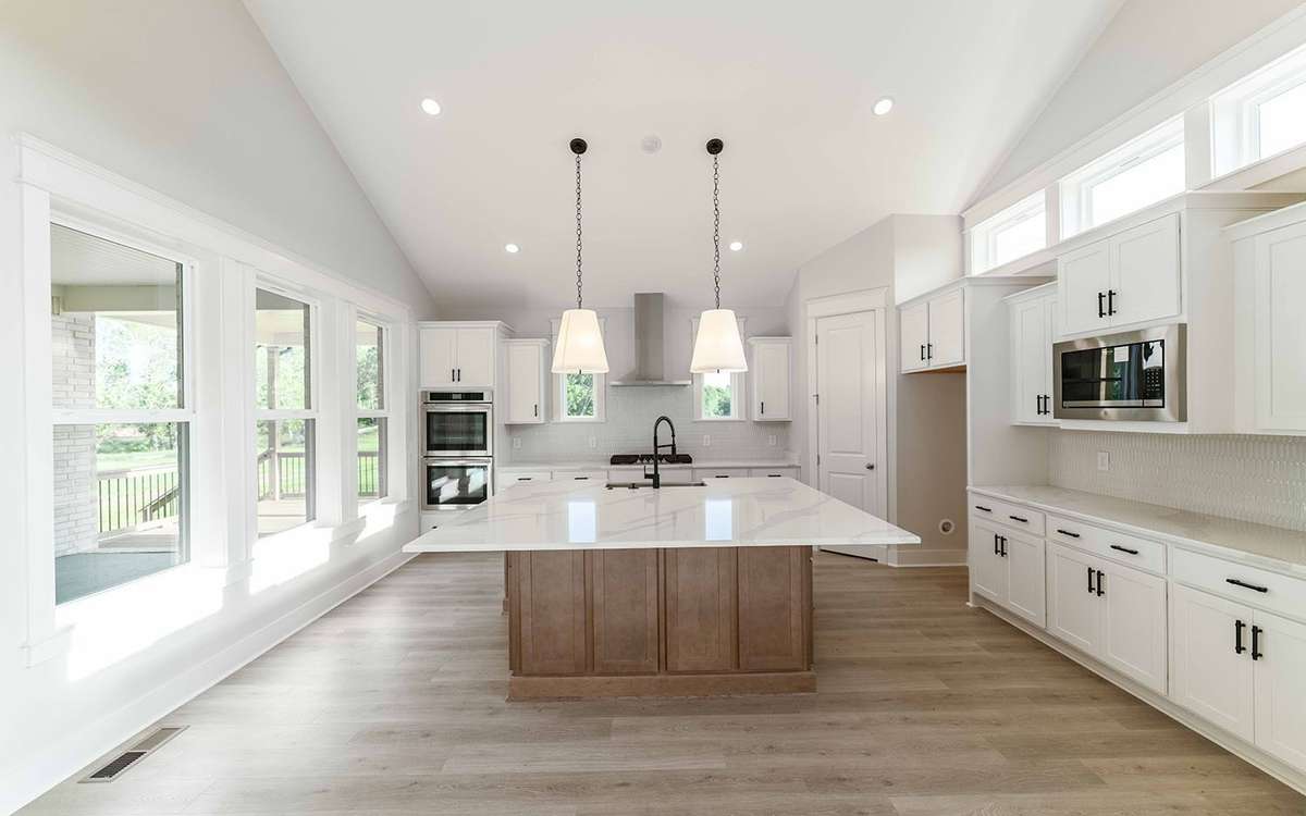 Photos are from another home with the same plan and are for representative purposes only.  Exterior and interior selections and upgrades may vary.