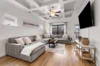 Beautiful coffered ceiling as you enter the home