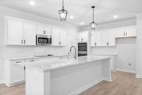 EXAMPLE PHOTO-COLORS AND MATERIALS MAY VARY.