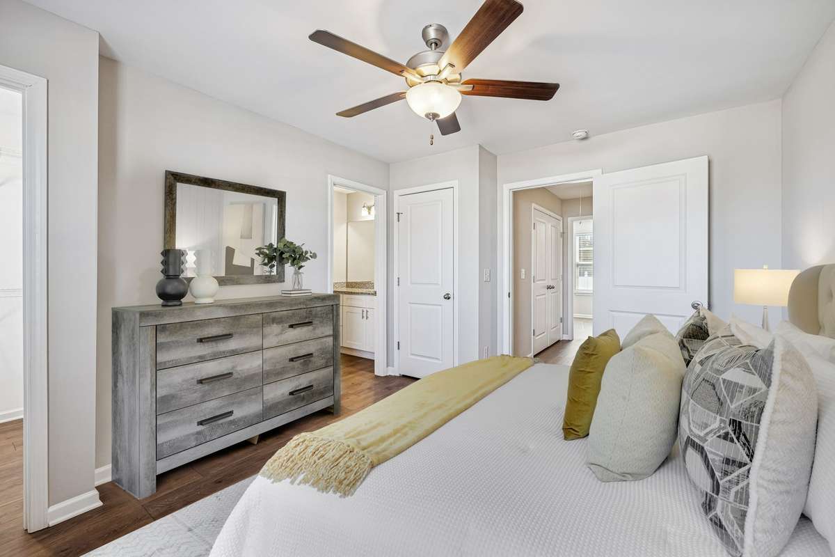 Virtually Staged - Primary Bedroom, features walk-in closet, with en-suite, and additional linen closet