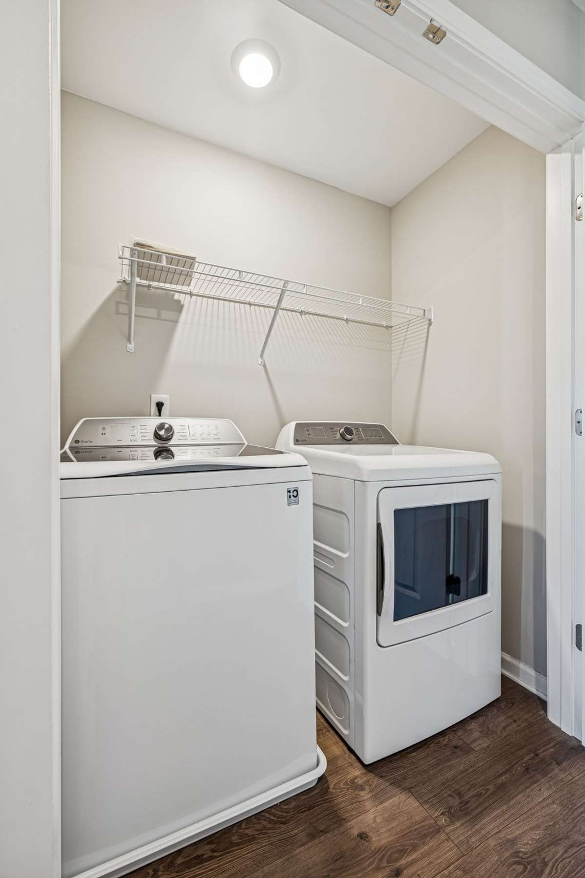 Full size Washer and Dryer to remain. Shelving for additional storage