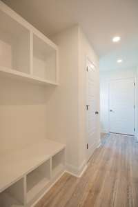 Mud Room Off Garage with Two Hall Trees!