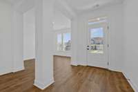 Sunny foyer and study.