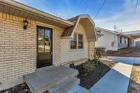 New 4-lite front door with new door hardware.