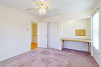 Upstairs Bedroom with built-in desk