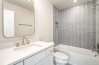 First floor bedroom with en suite bath  *Photos are for representational purposes only and are of a similar floor plan with differing finishes*