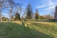 View out of the back of the home.  Very large lot, maybe for a pool??