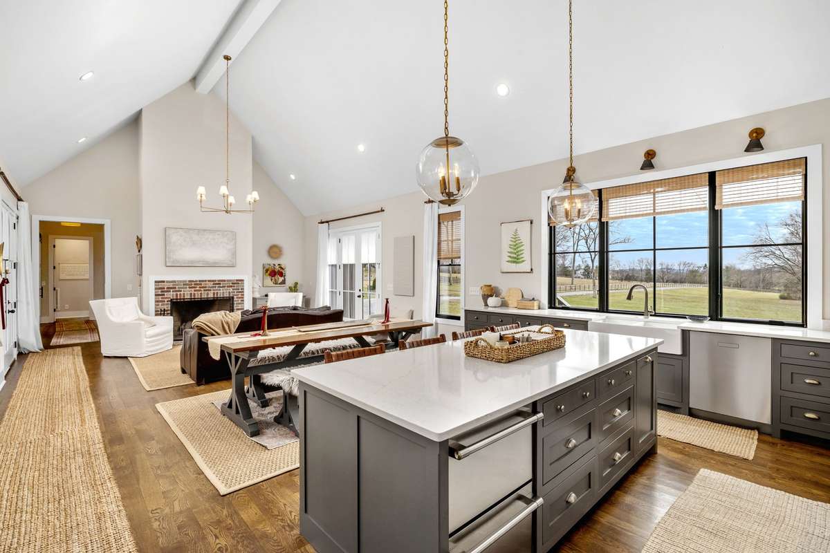 Perfectly designed with 4 bedrooms on the main level and Cathedral Ceilings around every corner.