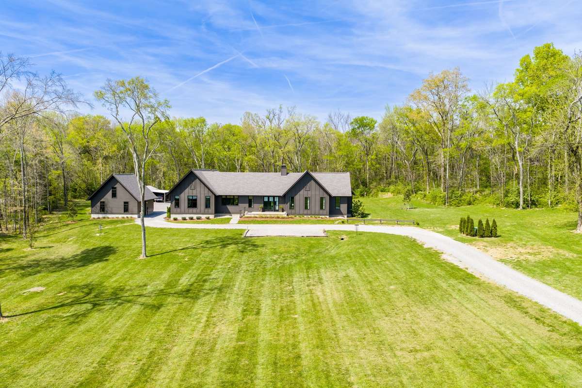 Spring Has Sprung! Lush green pasture surrounds the property and the tree canopy envelopes the property in serene privacy and quiet.