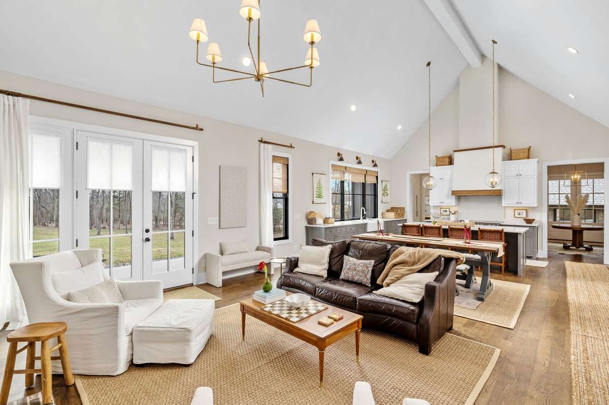 The flow of this home is unlike any other, purposefully designed with 3 distinct wings and multiple points of entry.
