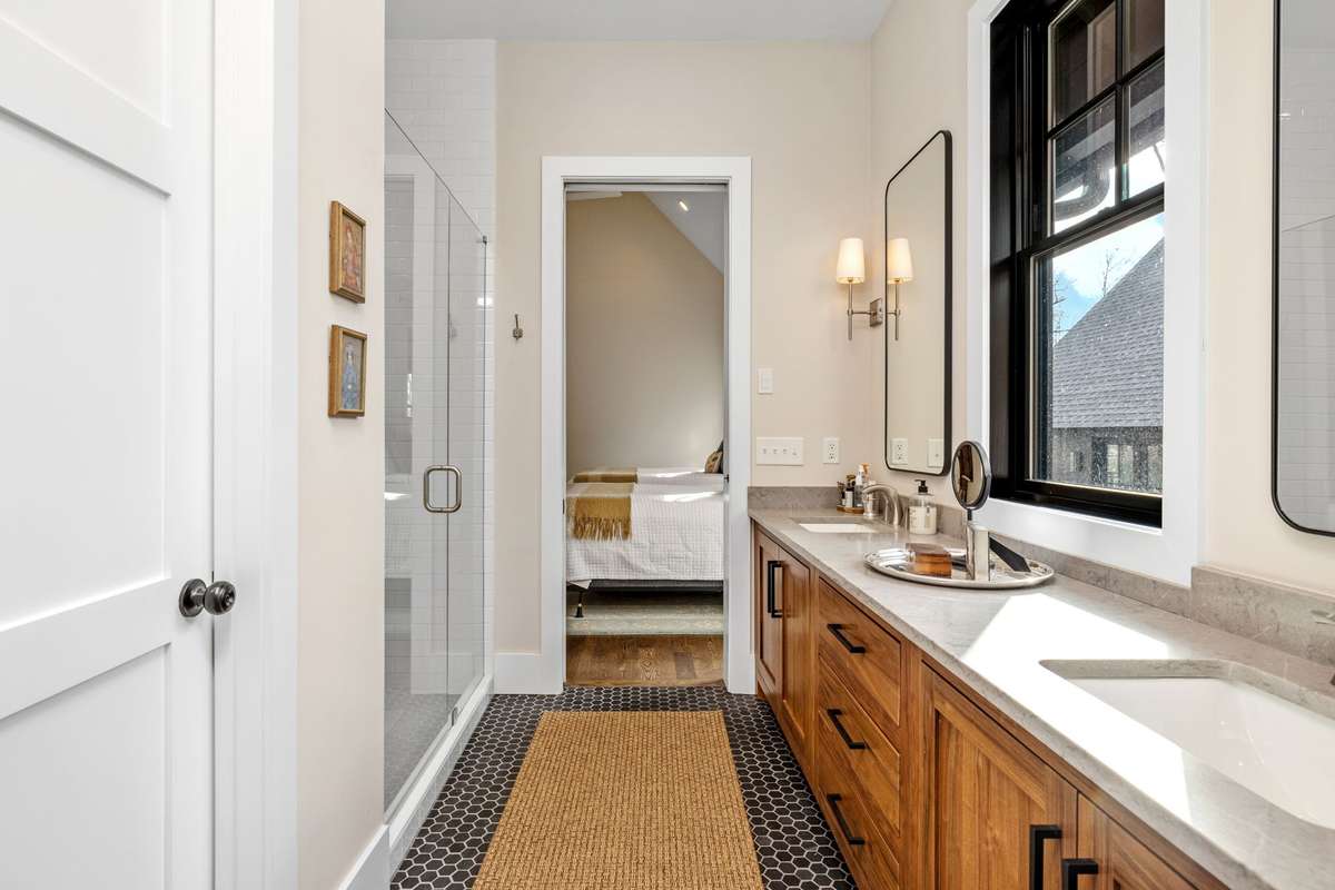 Photos will not capture the grandure of this primary suite. Every morning is a pleasure with so much space and the massive oversized shower.