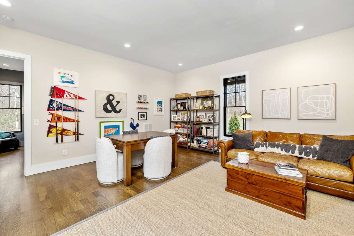 The space really lives well with separate areas for reading, puzzles, or television.