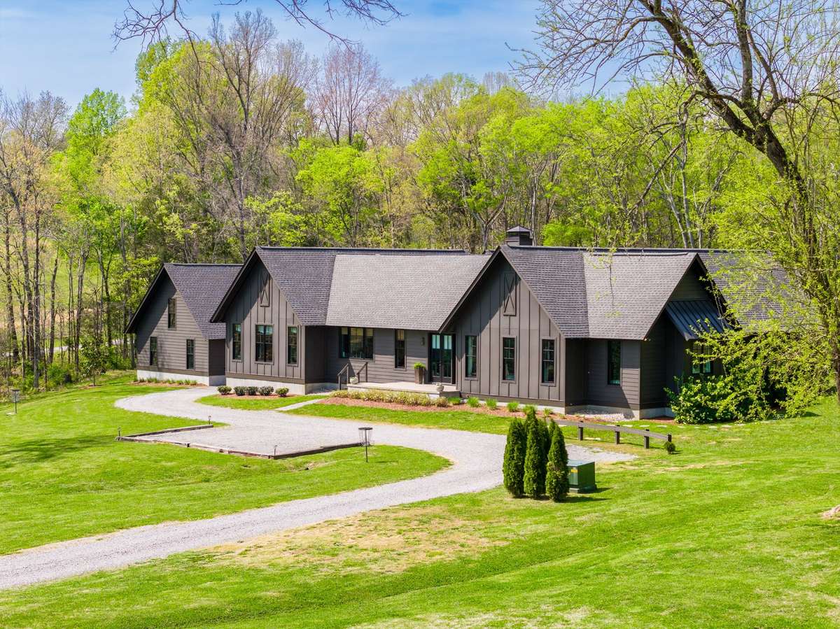 The idyllic, long driveway, meanders behind the home giving you a tour of the lush Tennessee landscape. Plus you are only 2 miles from Interstate 65 and 25 minutes to Nashville.