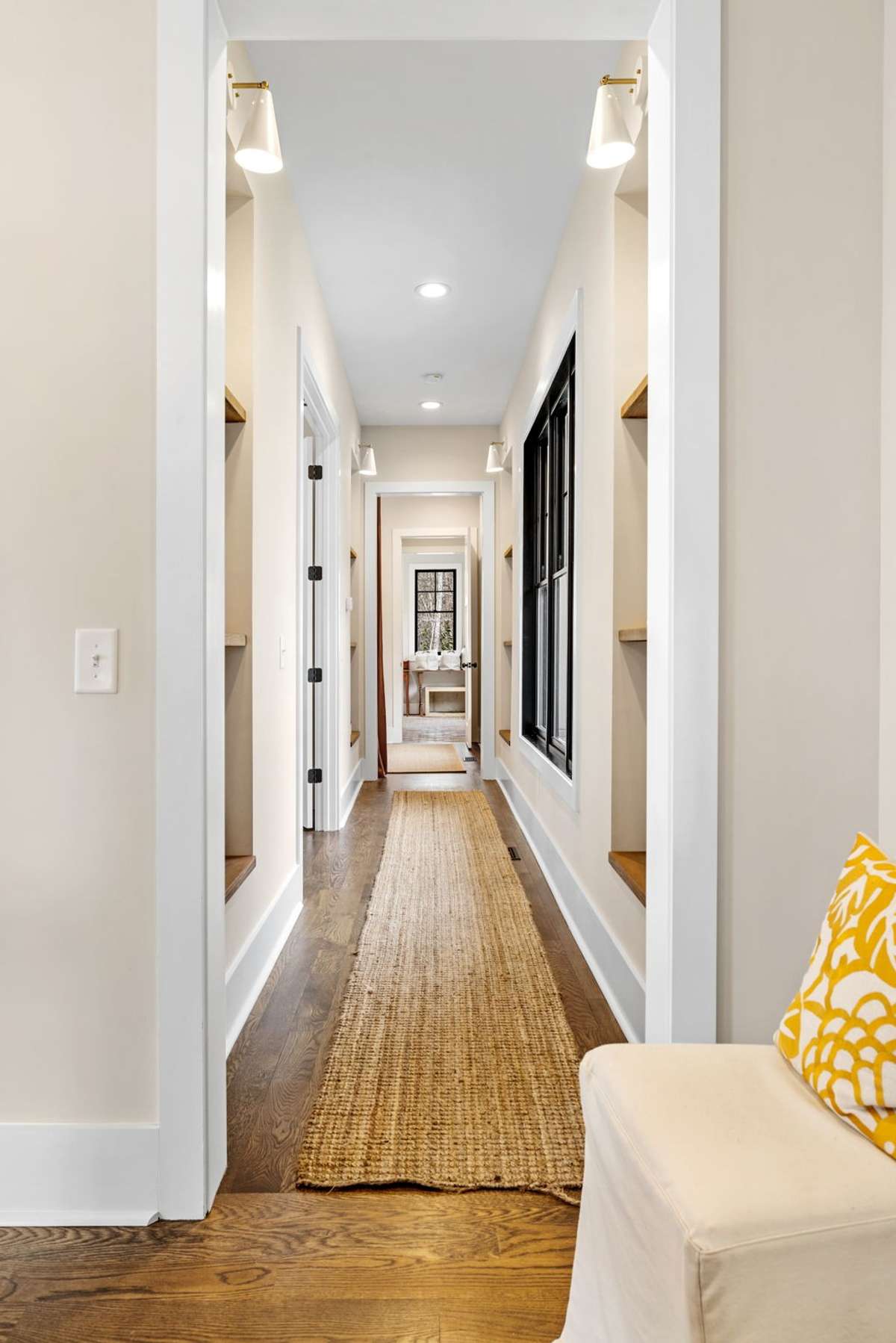 Come and see your private owner's wing with a wall of windows, cathedral ceilings, home office, parlor bathroom, and laundry room with boot bench.