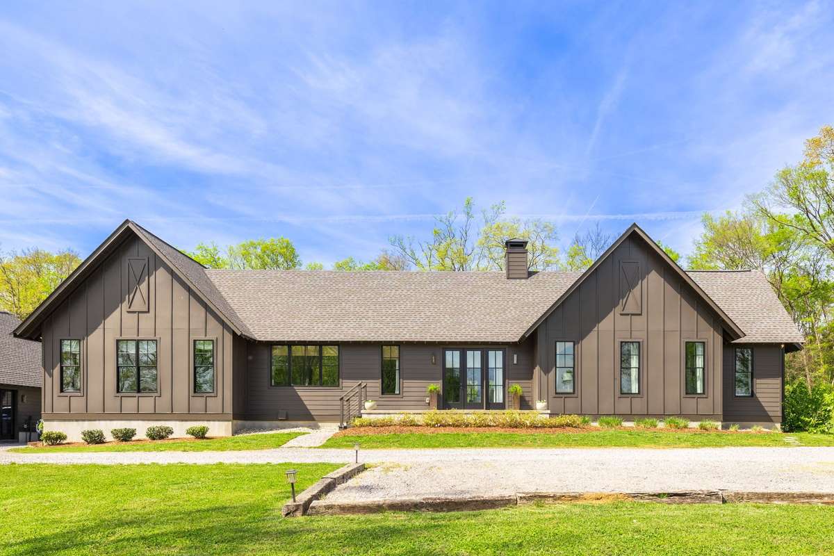 The homesite was designed and built in 2022 and back up to acres of woods and privacy.