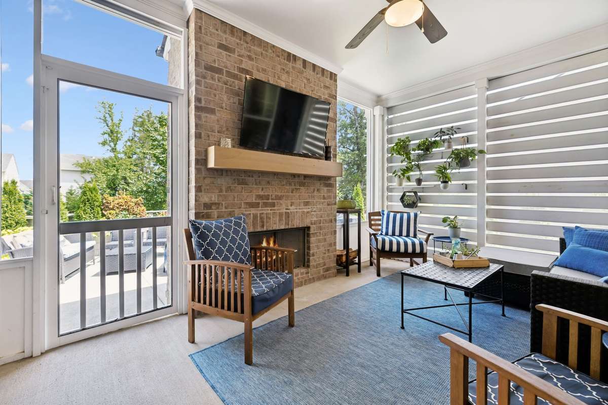 The screen door provides access to another outdoor entertaining area.