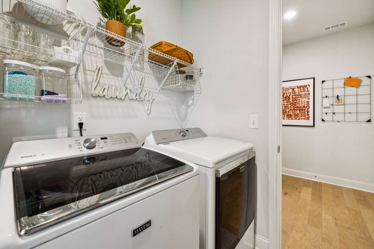 This space also connects to the mudroom/garage entry.