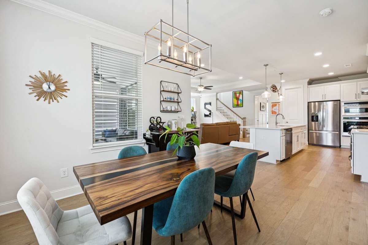 The view looking back to the kitchen and staircase. Light and bright heart of the home!