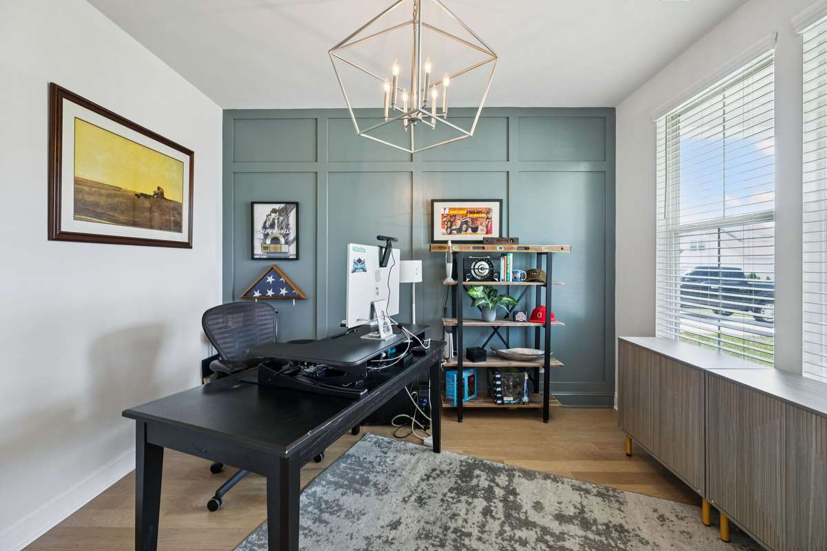 A sunny office/ den can be found to the right of the entry.