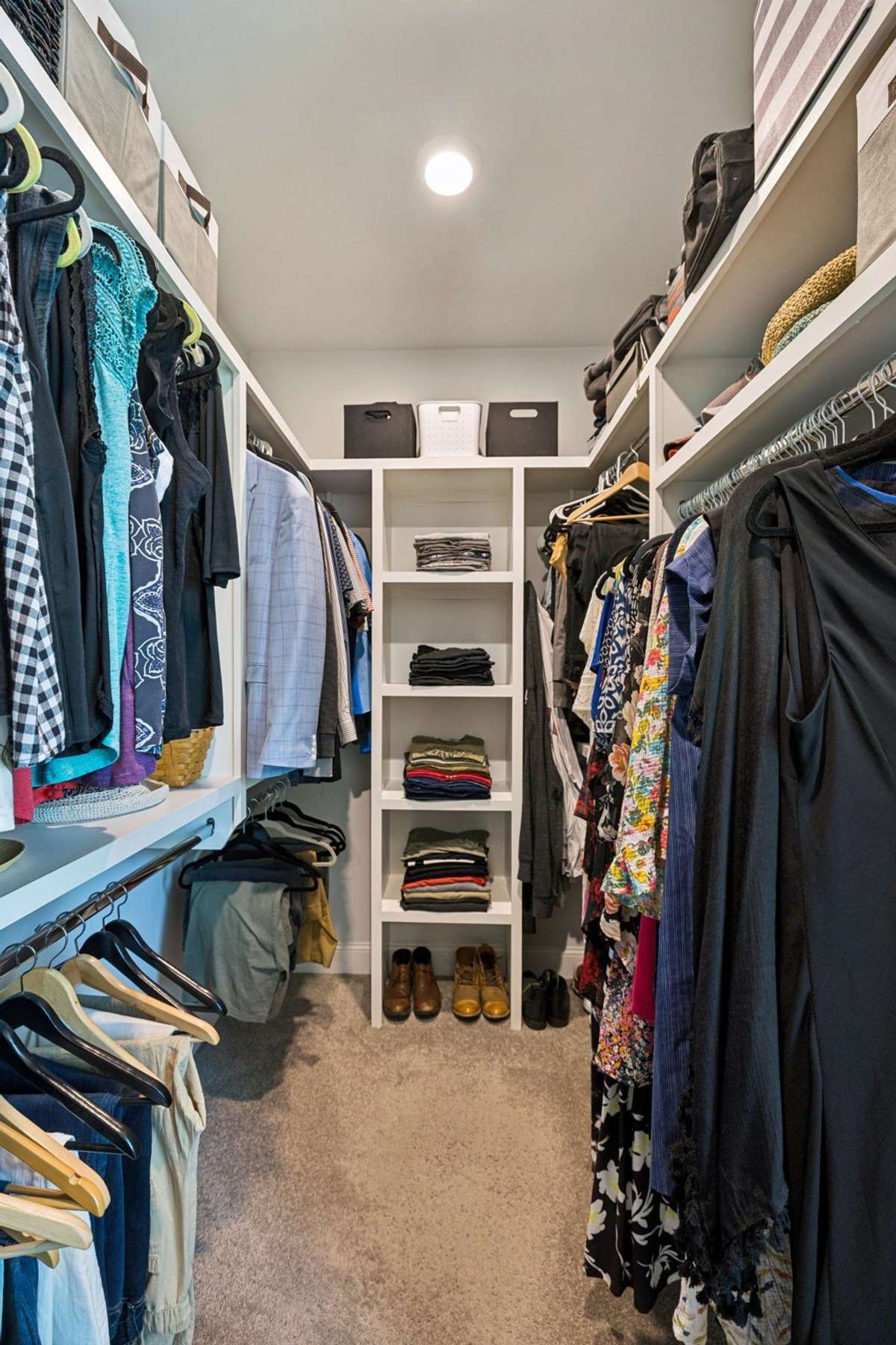 Primary closet with added shelving.