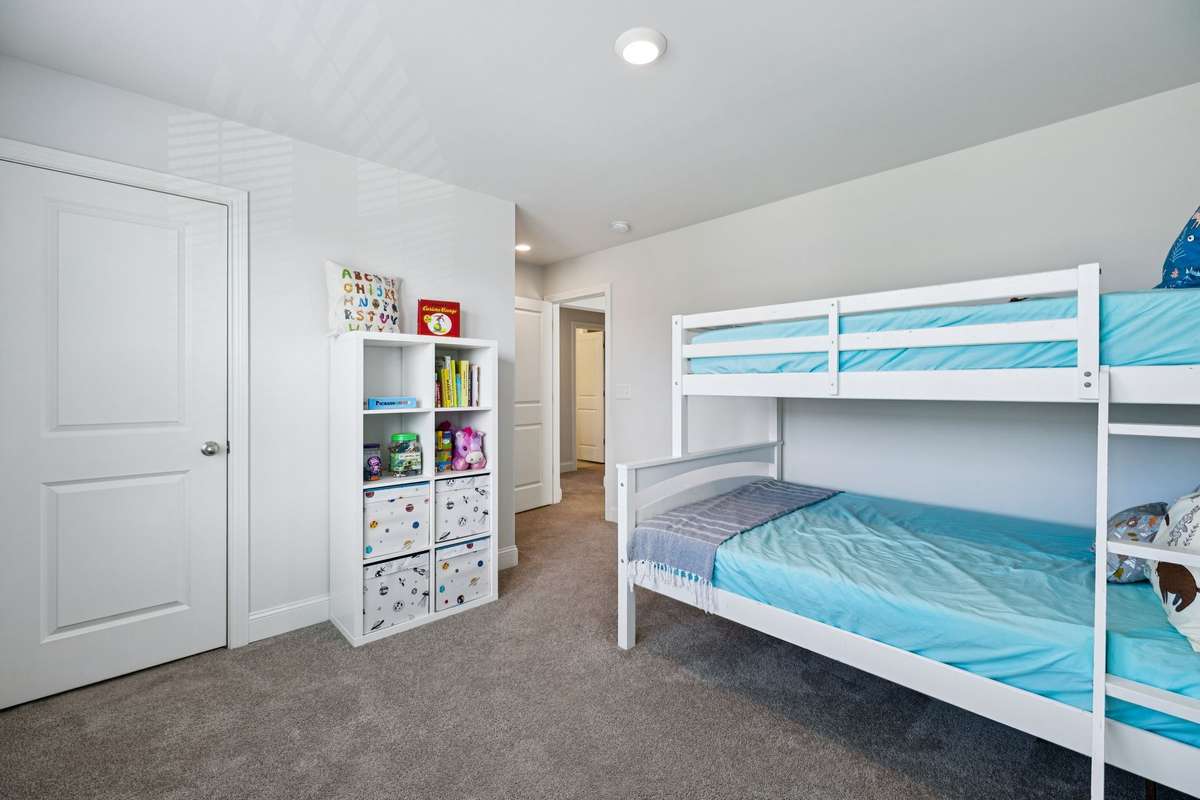 Bedroom #4 is oversized with a walk in closet.