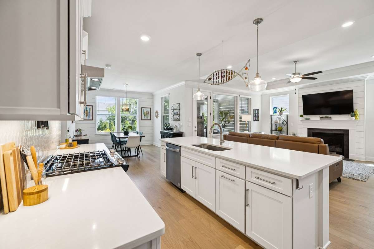 This heart of the home is bathed in natural light and provides access to a screened porch and extended deck area.