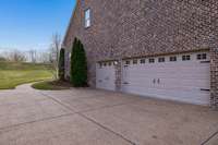 3 car garage with new epoxy floors