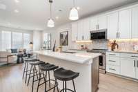 Kitchen  *Photos are of a similar floorplan with differing finishes.*