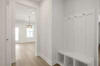 Drop zone included!!  Photos of example home only, build with your design features on your lot!