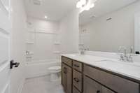 secondary bathroom! Photos of example home only, build with your design features on your lot!