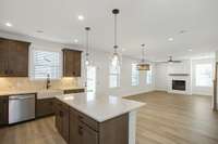 Open concept living space! Photos of example home only, build with your design features on your lot!