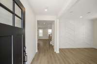 Enter into a perfectly crafted space featuring a flex area that can be used as an office or formal dining! Photos of example home only, build with your design features on your lot!