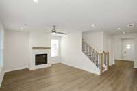 Open living space. Photos of example home only, build with your design features on your lot!