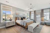 Primary Bedroom is Spacious and has plenty of room for king size bed and seating area.