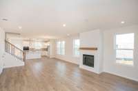 Optional Fireplace for those cozy winter nights! Photos not of actual home-but same floorplan-colors may vary.