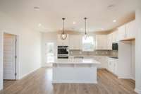 Kitchen. Photos not of actual home-but same floorplan-colors may vary.