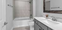 Full bath perfect for a guest suite, in laws, teens, or a 4th bedroom