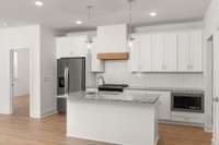 . This kitchen is a beautiful space for gathering and entertaining.