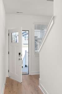 Step inside to discover the cozy charm of this inviting home, where warmth and comfort abound.