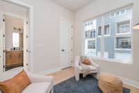 Second floor bedroom located behind the kitchen *Photos are for representational purposes only and are of a similar floor plan with differing finishes*