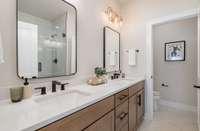 Primary bath with dual vanity sinks *Photos are for representational purposes only and are of a similar floor plan with differing finishes*