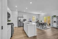 The house has a wonderful flow that seamlessly bridges indoor and outdoor living, connecting the interior space with the inviting patio.