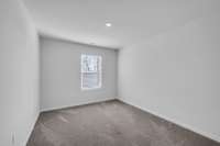 Fourth bedroom with walk-in closet.