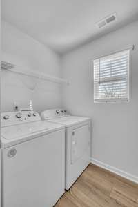 Ample laundry room, conveniently located in the second floor.