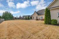 The community pool is walking distance from the house, but there is space back here for your own private pool if you would rather.