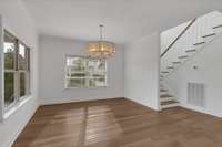 The white oak flooring extends to the stairs as well-even the handrails. It's absolutely gorgeous.