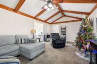 Another angle showcasing exposed beams, neutral tones, and a flexible layout.