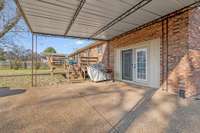 Attached carport offers covered parking and convenience.