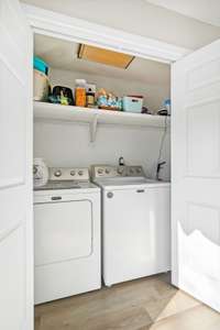 Conveniently located laundry area.