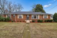 All brick home, perfectly placed on a spacious corner lot, in one of Nashville's favorite neighborhoods!